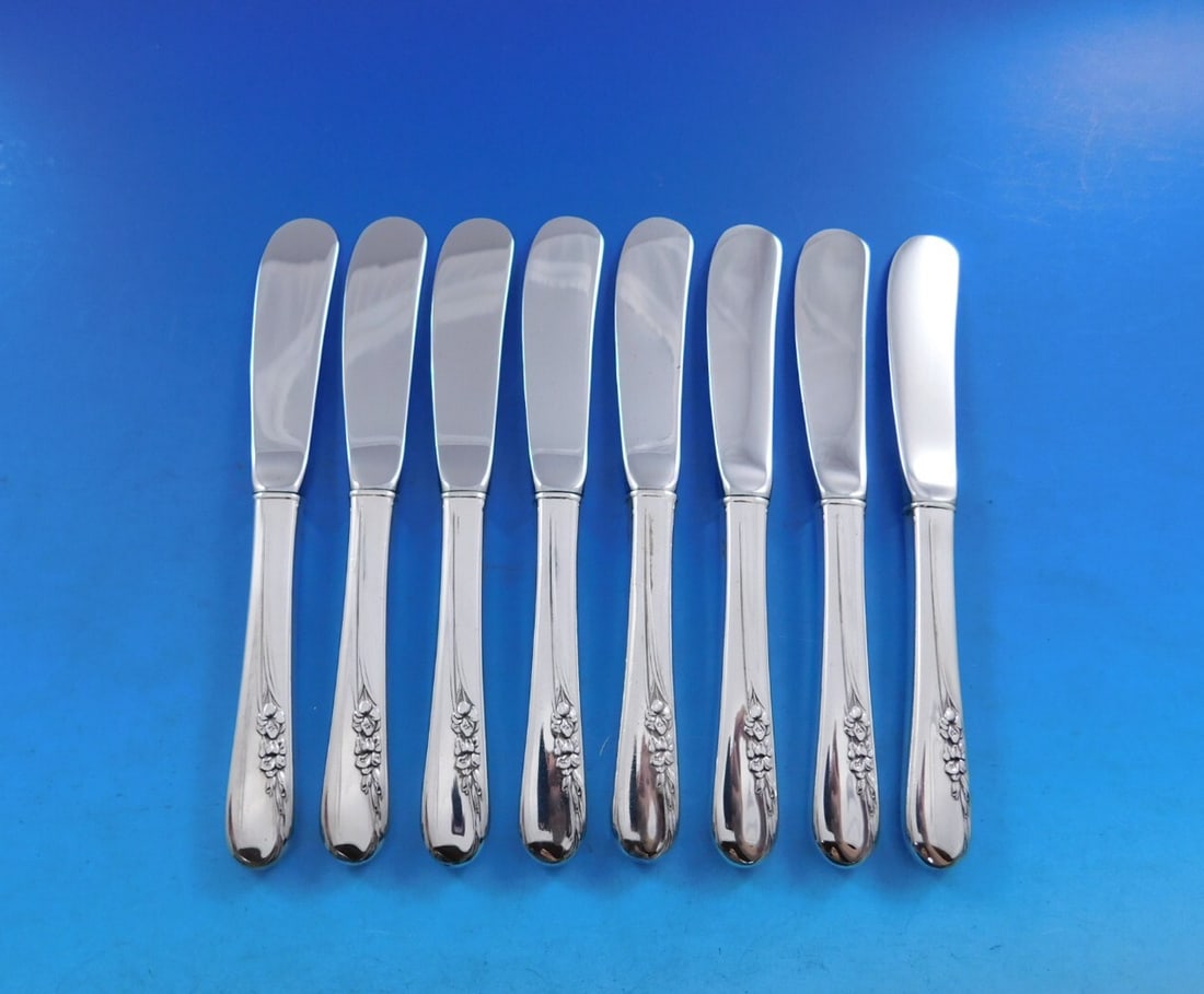 International Silver Blossom Time Set of 8 Butter Spreaders 6 inch: International Silver Blossom Time Set of 8 Butter Spreaders 6 inch Enhance your dining experience with this exquisite set of 8 butter spreaders from the Blossom Time pattern by International Sterling.
