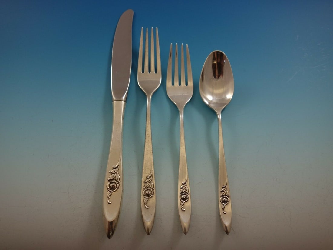 International Sterling Silver Romance Rose 4-Piece Place Setting: International Sterling Silver Romance Rose 4-Piece Place Setting Enhance your dining experience with this exquisite 4-piece place setting from the Romance Rose pattern by International Sterling. Craft