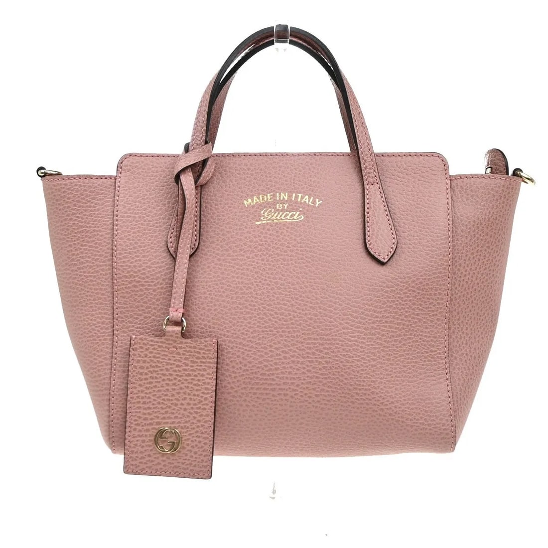 Gucci Swing Pink Leather Crossbody Bag Made in Italy: Gucci Swing Pink Leather Crossbody Bag Made in Italy This Gucci Swing Crossbody Bag features a pebbled leather exterior in pink, designed for women. The bag is crafted in Italy and offers a compact, f