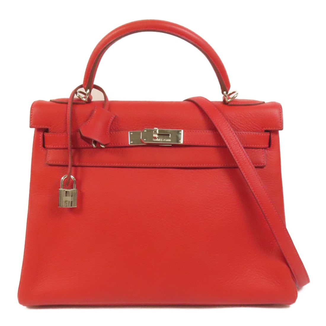 Hermes Kelly 32 Togo Leather Rouge de Coeur Shoulder Bag PHW: Hermes Kelly 32 Togo Leather Rouge de Coeur Shoulder Bag PHW This Hermes Kelly 32 is a versatile 2-way shoulder bag crafted from Togo leather in Rouge de Coeur, a striking red hue. Made in France, it 