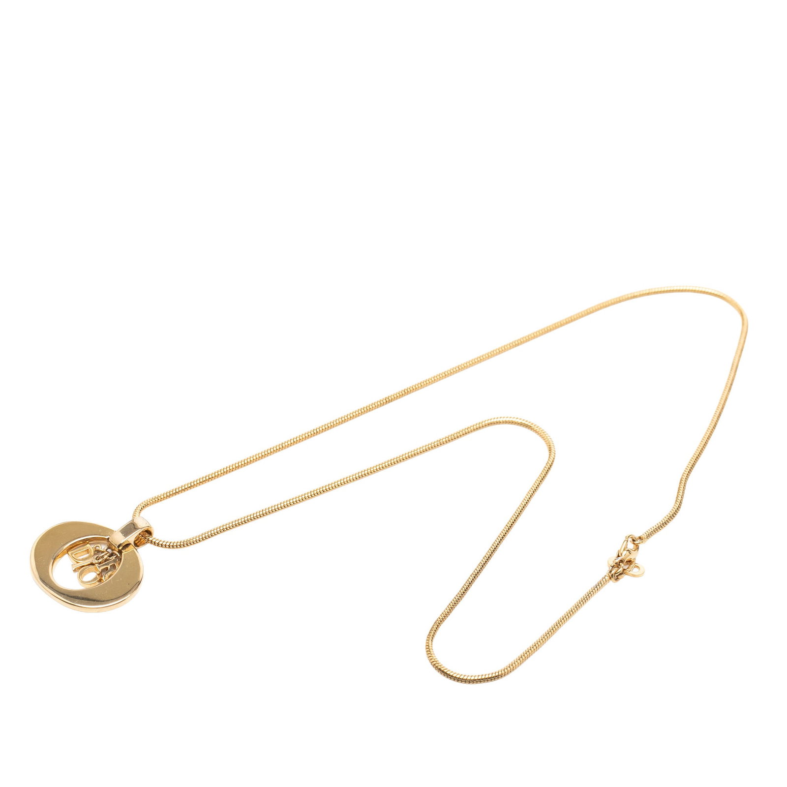 Dior CD Logo Pendant Necklace Gold Tone Metal: Dior CD Logo Pendant Necklace Gold Tone Metal Dior CD logo pendant necklace in gold-plated metal with a lobster clasp closure. This costume jewelry piece is made in Germany and shows visible wear, inc