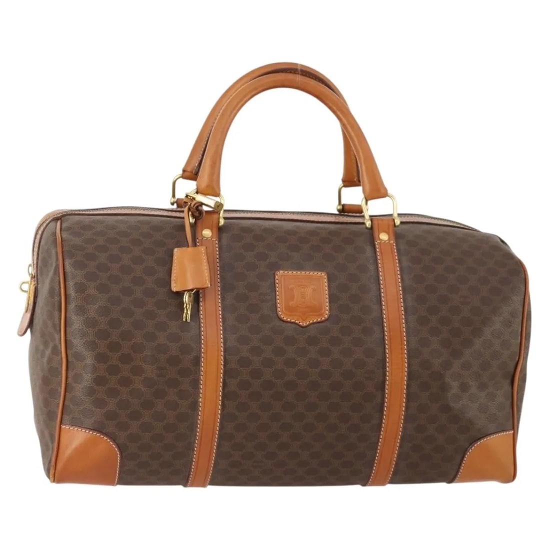 Celine Vintage Duffle Unisex Brown Canvas Bag: Celine Vintage Duffle Unisex Brown Canvas Bag Vintage Celine duffle bag in brown canvas with leather trim. This unisex bag is made in Italy and shows overall good condition with light rubbing, light c