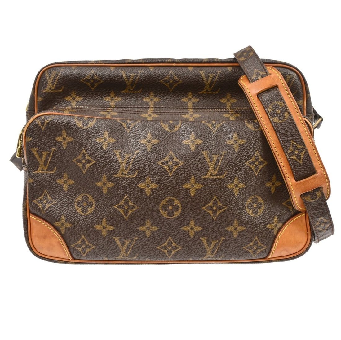 Louis Vuitton Nile Monogram Canvas Crossbody Bag M45244: Louis Vuitton Nile Monogram Canvas Crossbody Bag M45244 Vintage Louis Vuitton Nile crossbody shoulder bag in brown Monogram canvas with leather trim. This medium bag features a zip closure, adjustable