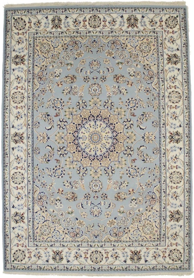 Hand-Knotted Wool Silk Floral Area Rug 4'11 x 7' Indo-Nain Design: Hand-Knotted Wool Silk Floral Area Rug 4'11 x 7' Indo-Nain Design This handmade Indo-Nain area rug features a classic floral pattern in light blue, cream, red, brown, green, tan, and navy tones. Craft