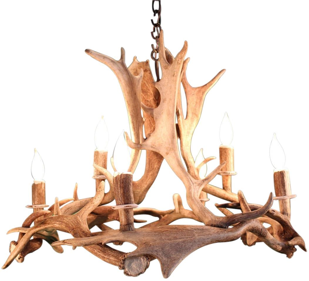 Handmade Lodge Style Antler Chandelier UL Listed 24H 34W 34D: Handmade Lodge Style Antler Chandelier UL Listed 24H 34W 34D Illuminate your space with this stunning unique antler chandelier, expertly handcrafted from genuine fallow antlers. Designed in a lodge st