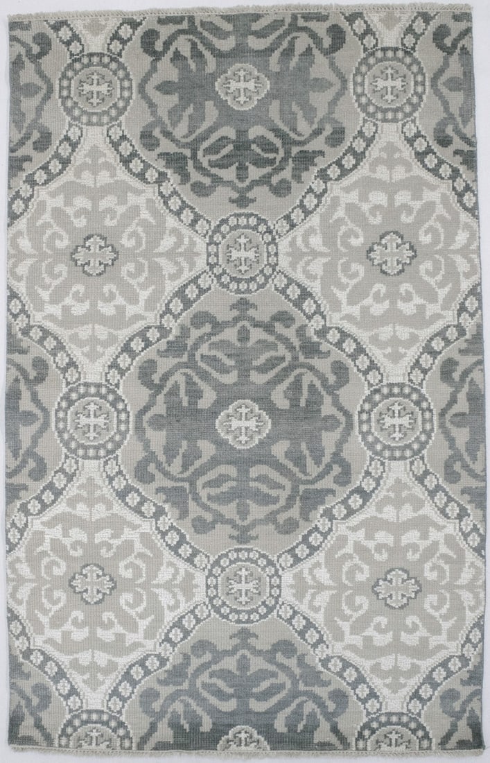 5'1 x 8' Hand-Knotted Wool Modern Geometric Area Rug from India: 5'1 x 8' Hand-Knotted Wool Modern Geometric Area Rug from India This hand-knotted oriental area rug features a modern geometric design in muted tones of gray, beige, and cream. Crafted from wool in In