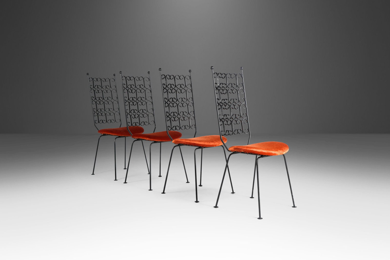 Set of 4 Arthur Umanoff Grenada Wrought Iron Dining Chairs 1960s Orange Velvet: Set of 4 Arthur Umanoff Grenada Wrought Iron Dining Chairs 1960s Orange Velvet This set of four Arthur Umanoff Grenada Collection dining chairs, crafted in the 1960s, showcases a striking blend of sty
