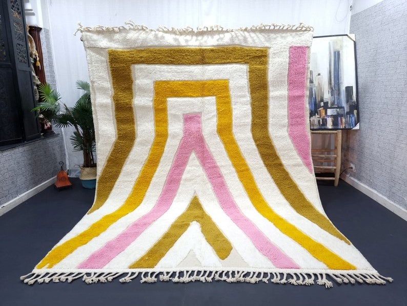 Authentic Handwoven Colorful Berber Rug from Morocco 8 x 5 Feet: Authentic Handwoven Colorful Berber Rug from Morocco 8 x 5 Feet Experience the vibrant beauty of this stunning engraved colorful rug, handwoven in the Atlas Mountains by skilled local Berber women wea