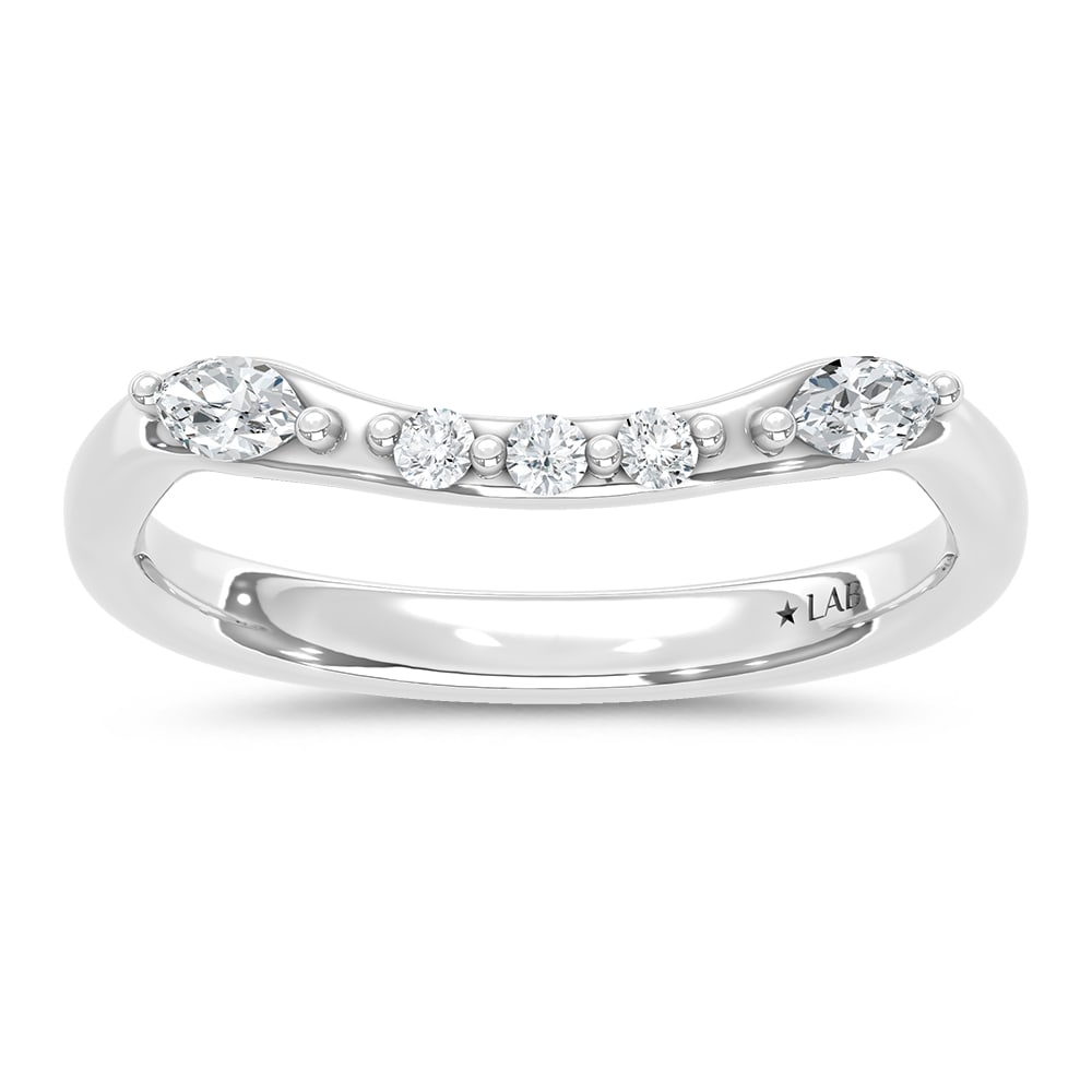 14K White Gold Lab Grown Diamond 1/4 Ct.T. Wedding Band: 14K White Gold Lab Grown Diamond 1/4 Ct.T. Wedding Band Indulge in timeless elegance with our exquisite 14K White Gold Wedding Band, adorned with a meticulously crafted lab-grown diamond. The brillian