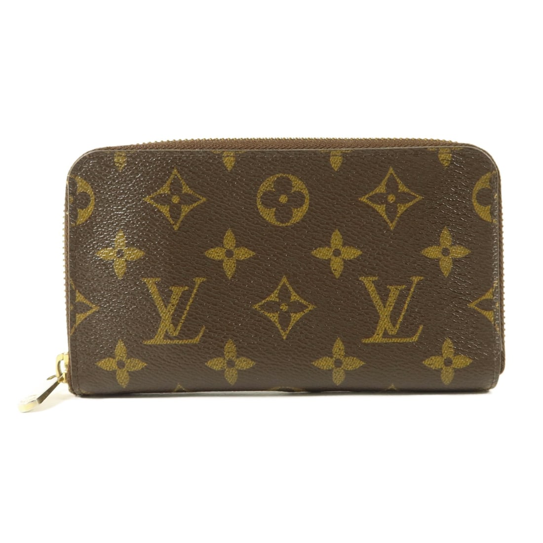 Louis Vuitton Monogram Brown Round Wallet: Louis Vuitton Monogram Brown Round Wallet This Louis Vuitton round zipper wallet features the iconic monogram pattern on brown PVC coated canvas. Designed for women, it offers a secure zip closure and