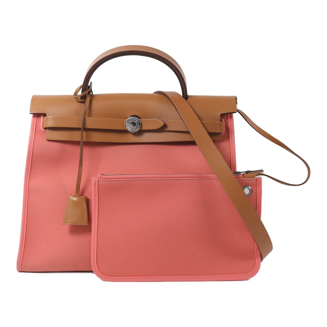 Herbag PM Pink Canvas 2-Way Shoulder Bag by Hermes: Herbag PM Pink Canvas 2-Way Shoulder Bag by Hermes This Hermes Herbag PM is a versatile 2-way shoulder bag crafted from pink canvas. It features both shoulder and handheld carrying options and is desi
