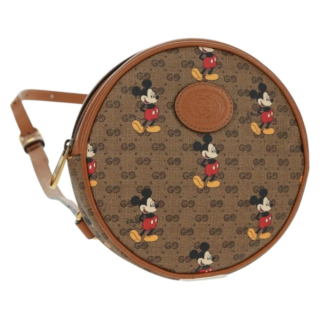 Disney Micro GG Supreme PVC Backpack by Gucci Beige Gold with Dust Bag: Disney Micro GG Supreme PVC Backpack by Gucci Beige Gold with Dust Bag This GUCCI Micro GG Supreme Disney backpack features a beige and gold color scheme and is crafted from PVC leather with micro sma