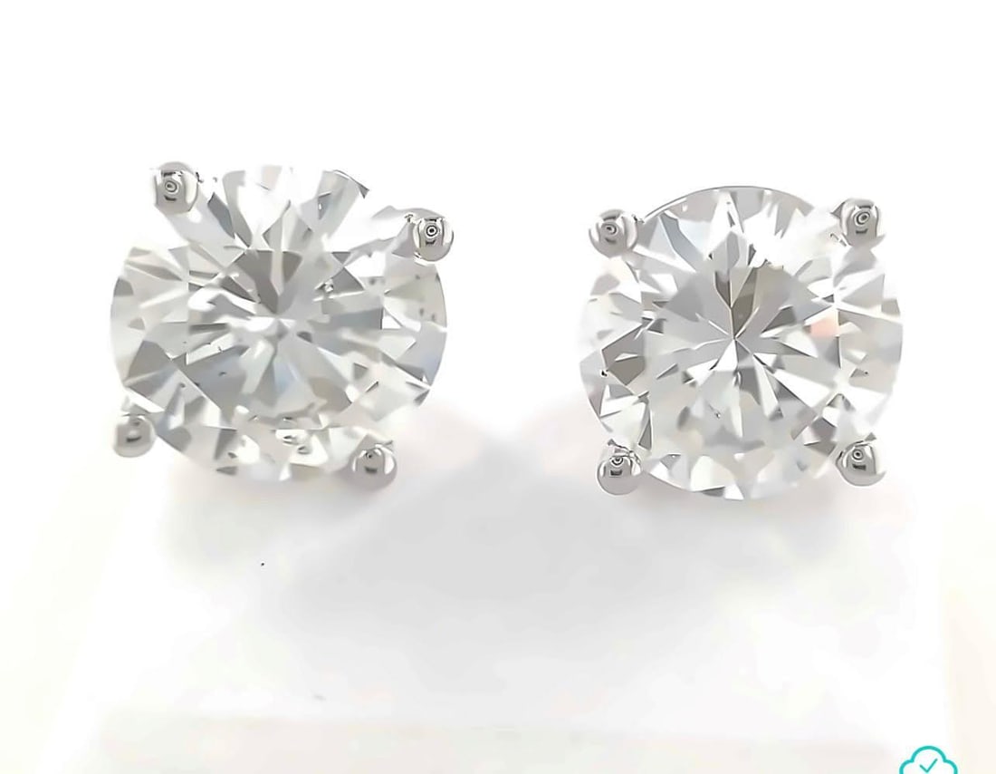 GIA Certified 1.92ct D SI2 Diamond 14k White Gold Stud Earrings: GIA Certified 1.92ct D SI2 Diamond 14k White Gold Stud Earrings Elevate your elegance with this exquisite pair of diamond stud earrings. Crafted in 14k white gold, these stunning martini frame studs f