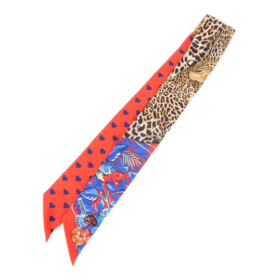 Hermes Jungle Love Twilly Silk Multicolor Scarf: Hermes Jungle Love Twilly Silk Multicolor Scarf This Hermes Jungle Love Love Twilly scarf is crafted from luxurious silk and features a vibrant multicolor design. Made in France, this elegant accessor