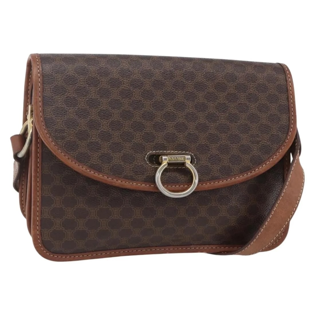 Celine Canvas Flap Shoulder Bag in Brown: Celine Canvas Flap Shoulder Bag in Brown This Celine Flap Shoulder Bag is crafted from brown canvas and designed for women. The bag features a structured flap closure and has visible signs of use, inc
