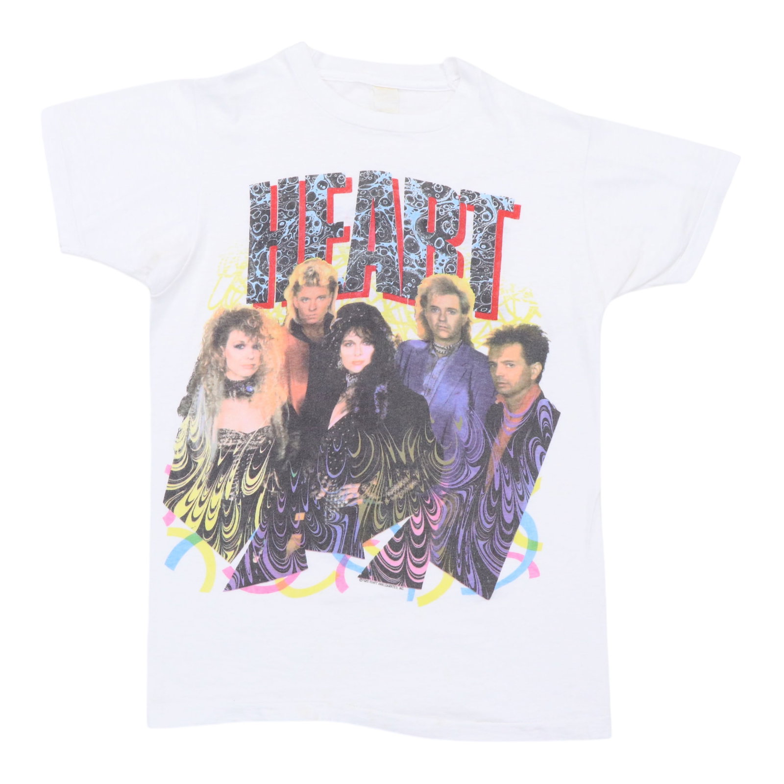 Vintage 1985 Heart Concert Tour White Cotton Band T Shirt: Vintage 1985 Heart Concert Tour White Cotton Band T Shirt This is an original vintage 1985 Heart World Tour shirt featuring graphics on both the front and back. Made from 100% cotton, the shirt comes 