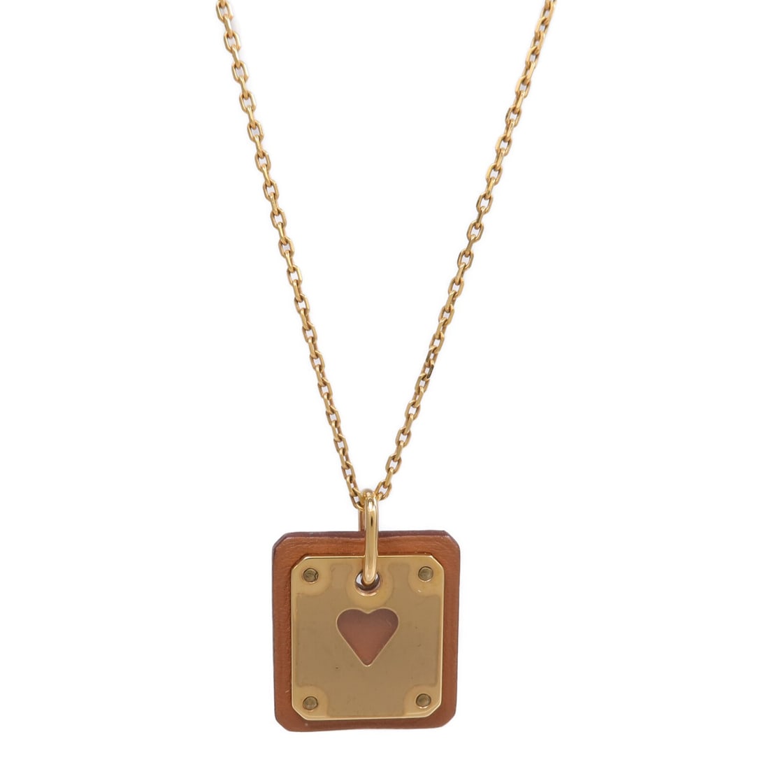Hermes As De Coeu Brown Leather Necklace with Gold Tone Hardware: Hermes As De Coeu Brown Leather Necklace with Gold Tone Hardware This women's Hermes As De Coeur necklace features a brown leather cord with metal accents. Crafted in France, the necklace showcases a 
