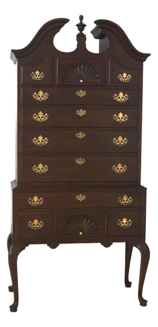 Chippendale Style Mahogany Highboy With Queen Anne Legs and Brass Hardware: Chippendale Style Mahogany Highboy With Queen Anne Legs and Brass Hardware This Drexel Heritage highboy showcases a classic 18th-century Chippendale-inspired design, crafted from fine mahogany. It fea