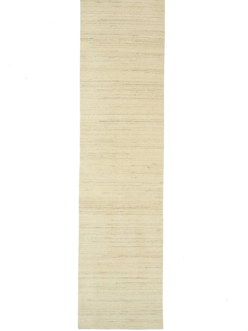 Cream Wool Gabbeh Runner Rug 2'7 x 10'0 Hand-Loomed: Cream Wool Gabbeh Runner Rug 2'7 x 10'0 Hand-Loomed Enhance your home decor with this Solid Cream Hand-Loomed Gabbeh Wool Runner Rug. Perfect for hallways or kitchens, this beautiful rug showcases a m