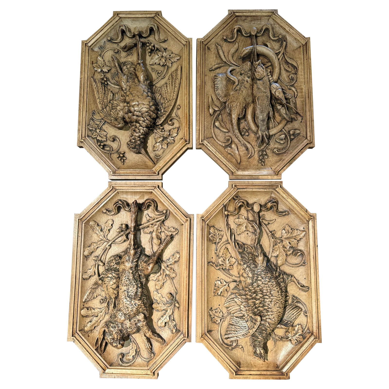 Set of 4 Antique 19th Century Black Forest Carved Hunt Trophies: Set of 4 Antique 19th Century Black Forest Carved Hunt Trophies Enhance your rustic decor with this exquisite set of four 19th Century French Black Forest carved hunt trophies. Crafted in Switzerland 