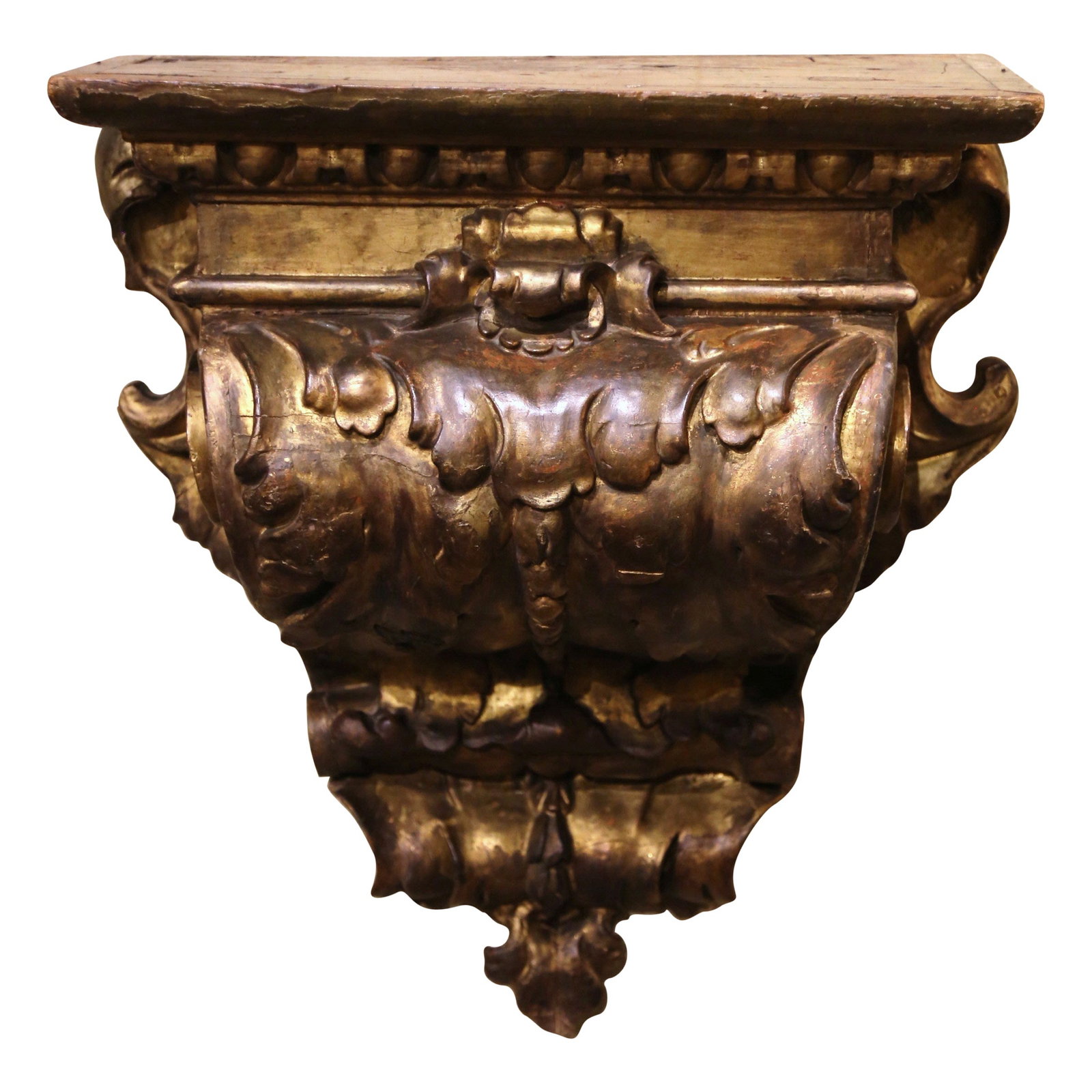 Italian Baroque Giltwood Wall Bracket Console 26 x 22.25 x 11.5 in: Italian Baroque Giltwood Wall Bracket Console 26 x 22.25 x 11.5 in This impressive mid-18th century Italian Baroque wall bracket console is hand-carved from giltwood and features richly detailed scrol