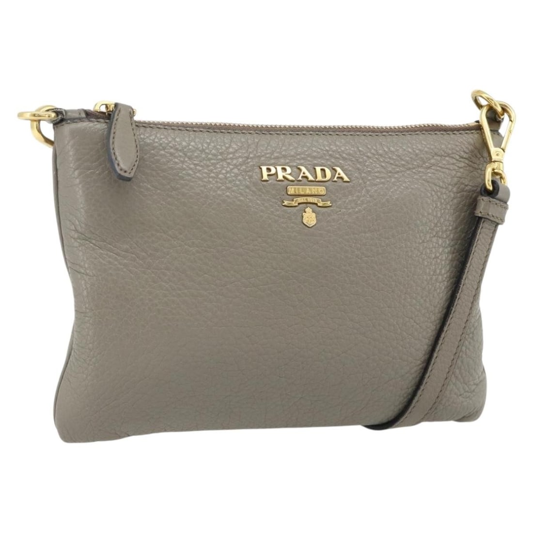 PRADA Gray Leather Shoulder Bag Gold Tone Romania 176055A: PRADA Gray Leather Shoulder Bag Gold Tone Romania 176055A Prada shoulder bag in gray leather with gold-tone accents. Made in Romania, this women's bag includes an adjustable shoulder strap and is offe