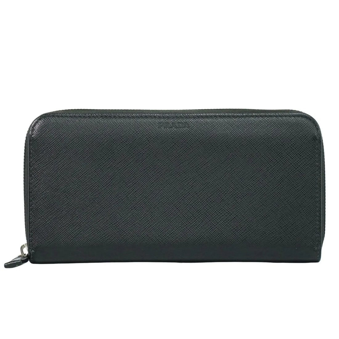 Prada Saffiano black leather wallet made in Italy: Prada Saffiano black leather wallet made in Italy This Prada Saffiano wallet for women features black leather with a textured finish. It measures 20 cm wide, 10 cm high, and 2.5 cm deep. The wallet sh