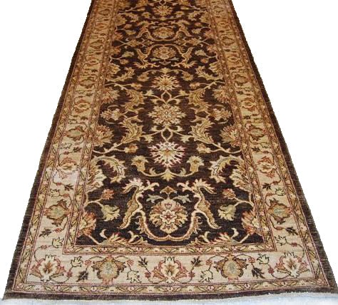 Handmade 4 x 12.4 Ziglar Runner Rug in Dark Brown: Handmade 4 x 12.4 Ziglar Runner Rug in Dark Brown Free continental US Shipping Enhance your home decor with this stunning handmade Ziglar runner rug, measuring 4 ft by 12.4 ft in a rich dark brown col