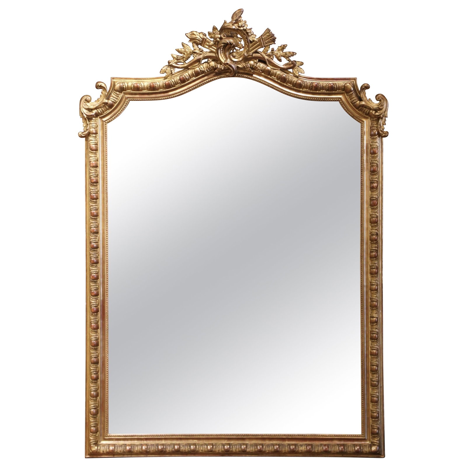 19th Century French Louis XV Giltwood Arched Mirror circa 1870: 19th Century French Louis XV Giltwood Arched Mirror circa 1870 This exquisite 19th Century French Louis XV Carved and Arched Giltwood Wall or Mantel Mirror is a stunning example of mid-19th century ar