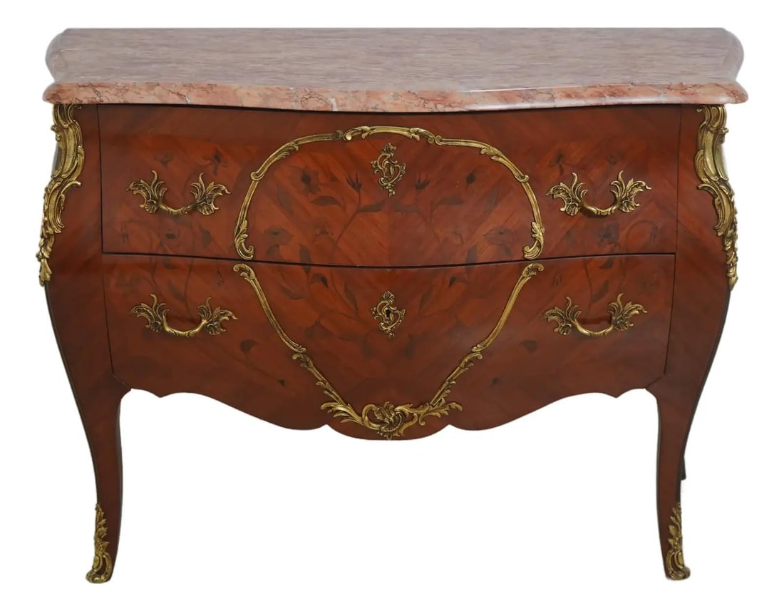 French Bombe Chest With Marquetry Inlay and Marble Top Two Drawer: French Bombe Chest With Marquetry Inlay and Marble Top Two Drawer This vintage Louis XV style commode features a bombe curved case with intricate marquetry inlay and ornate brass ormolu mounts. The pi