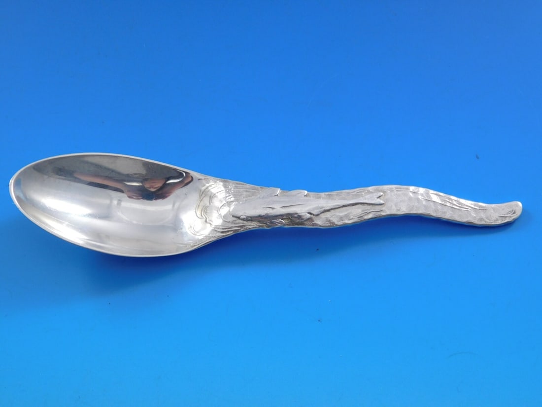 Tiffany & Co Sterling Silver Teaspoon Catfish Lap Over Edge 6 1/4: Tiffany & Co Sterling Silver Teaspoon Catfish Lap Over Edge 6 1/4 This exquisite Tiffany & Co. sterling silver teaspoon measures 6 1/4" and features the elegant Lap Over Edge pattern. The design showc
