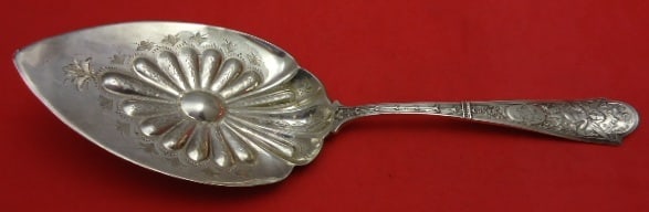 Shiebler Cupid Sterling Silver Pie Server 10 1 2 Inch Embossed Blade: Shiebler Cupid Sterling Silver Pie Server 10 1 2 Inch Embossed Blade This is a Shiebler sterling silver pie server in the Cupid pattern, featuring a flat handle and an embossed, brite cut blade. The s