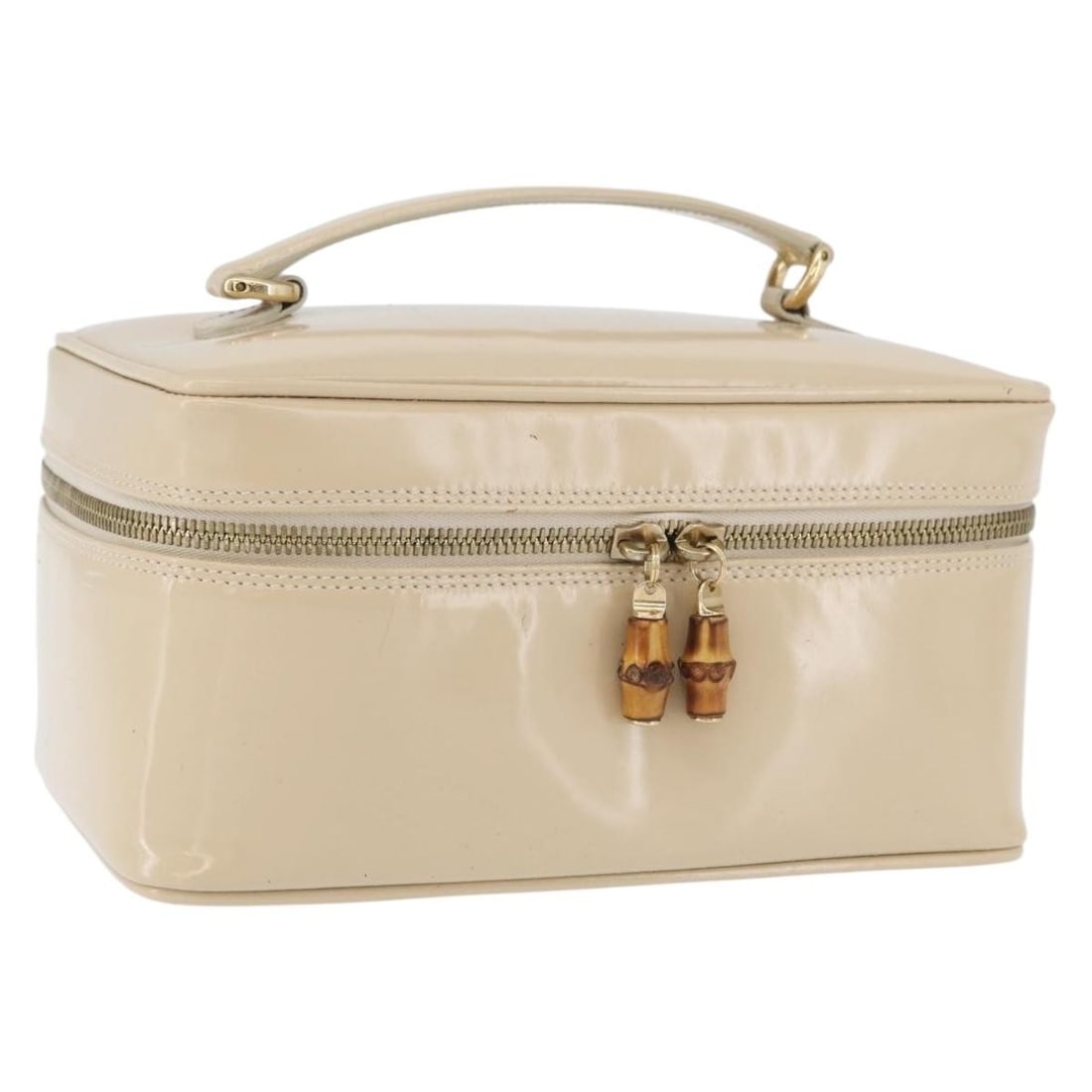 Gucci Bamboo patent leather beige gold vanity handbag Italy: Gucci Bamboo patent leather beige gold vanity handbag Italy This GUCCI Bamboo Vanity Hand Bag features a stylish combination of beige and gold patent leather with bamboo handles. Crafted in Italy, it 
