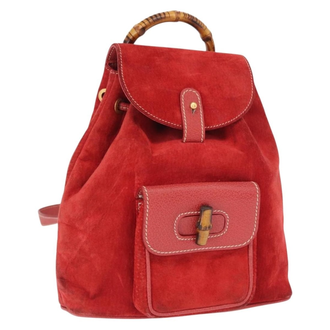 Red Suede Gucci Bamboo Backpack with Gold Accents 003 2034 0030: Red Suede Gucci Bamboo Backpack with Gold Accents 003 2034 0030 This GUCCI Bamboo Backpack features a red and gold suede exterior with bamboo accents. Made in Italy, the backpack has a compact design 