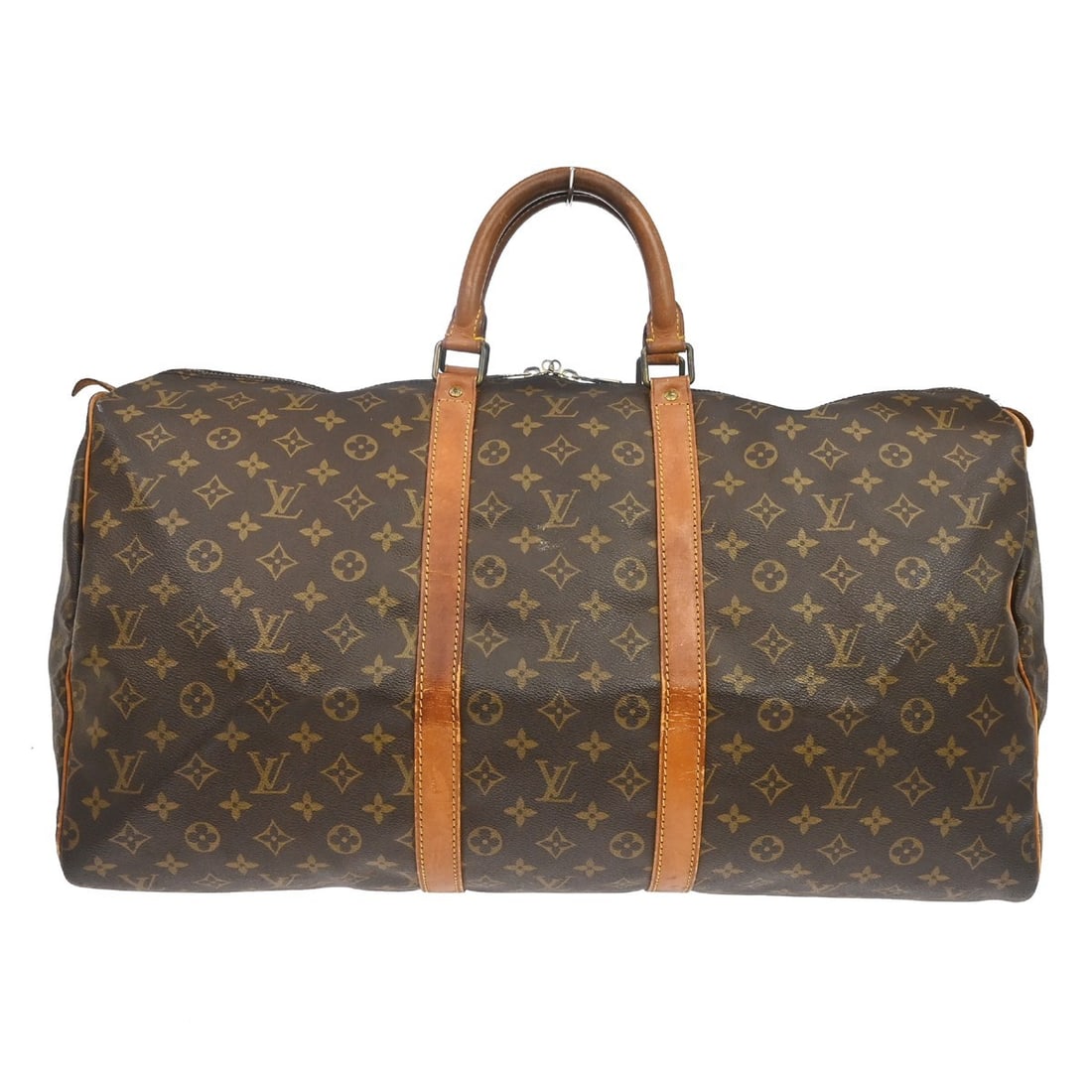 Louis Vuitton Keepall 55 Monogram Canvas Duffle Bag M41424: Louis Vuitton Keepall 55 Monogram Canvas Duffle Bag M41424 Vintage Louis Vuitton Keepall 55 travel handbag in Monogram canvas and leather with double handles and zip closure. This extra-large unisex d