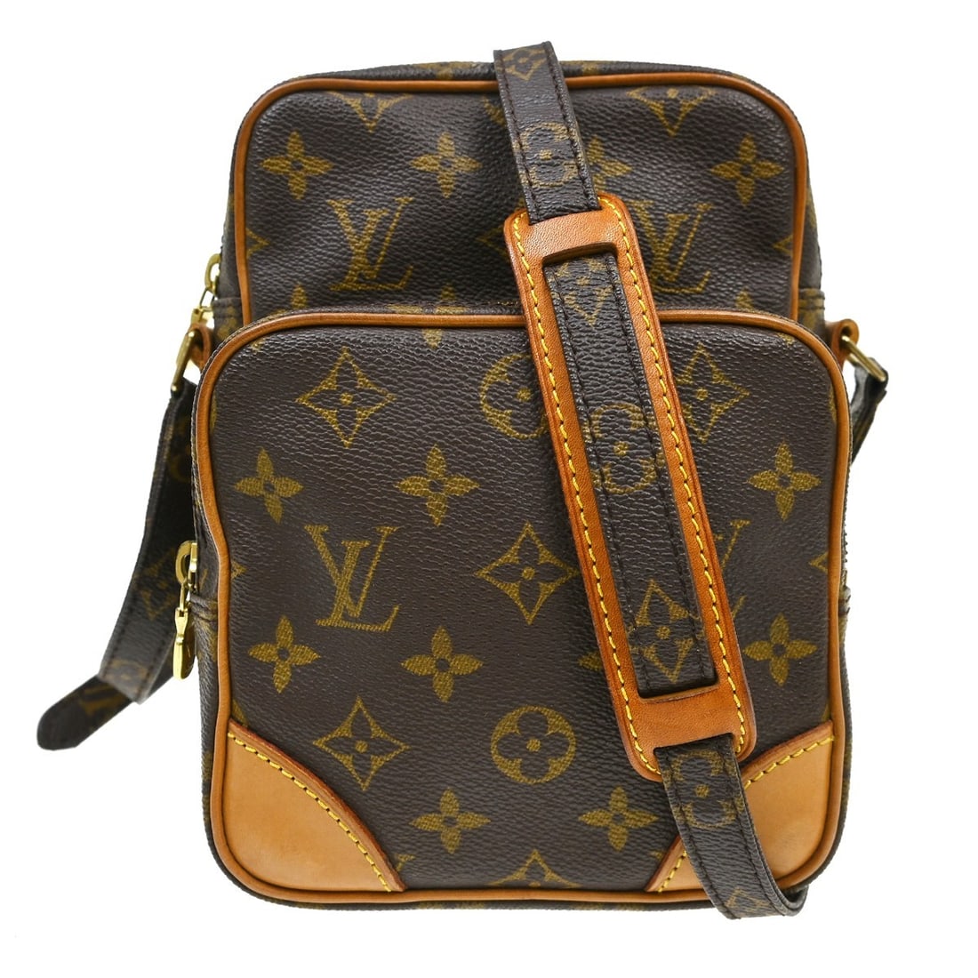 Louis Vuitton Amazon Monogram Canvas Crossbody Bag M45236: Louis Vuitton Amazon Monogram Canvas Crossbody Bag M45236 Vintage Louis Vuitton Amazone crossbody bag in brown Monogram canvas with leather trim and a zip closure. This unisex bag features an adjustab