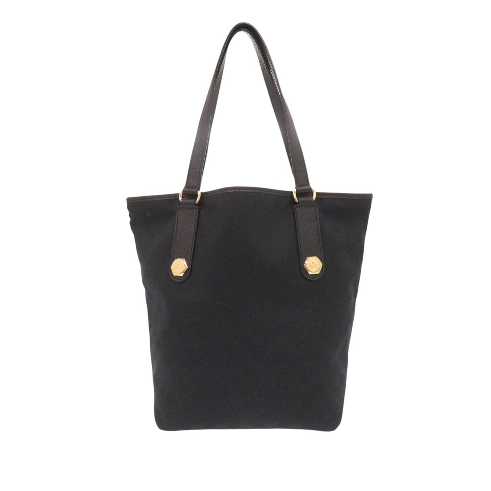 Gucci Charmy Tote in Black GG Canvas and Leather: Gucci Charmy Tote in Black GG Canvas and Leather Gucci Charmy tote bag in black GG canvas with leather trim and flat leather straps. The open-top design includes an interior with zip and slip pockets.