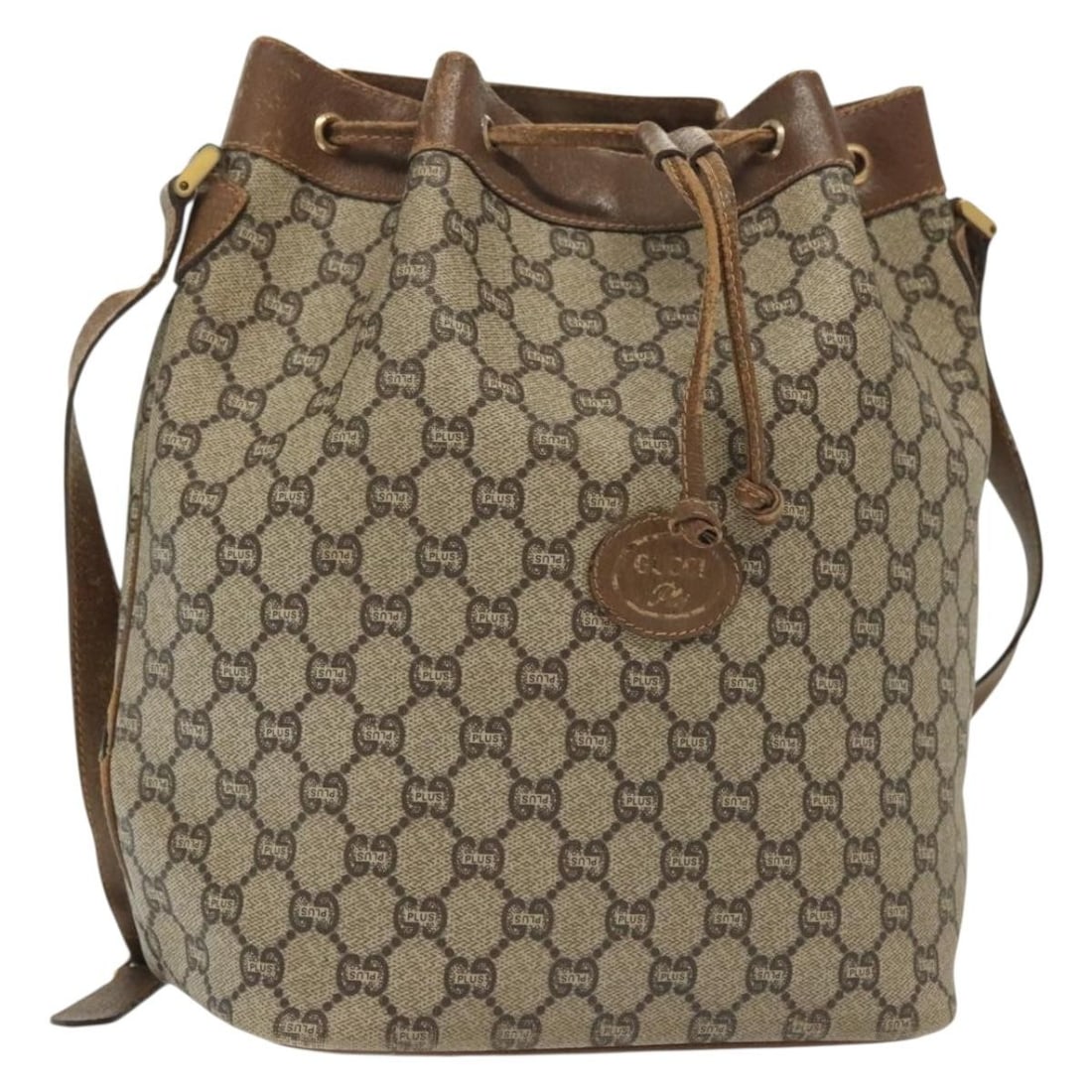 Gucci GG Plus Supreme PVC Leather Shoulder Bag Beige Gold: Gucci GG Plus Supreme PVC Leather Shoulder Bag Beige Gold Gucci GG Plus Supreme shoulder bag in beige and gold with PVC leather and GG canvas construction. Made in Italy, this women's bag features a s