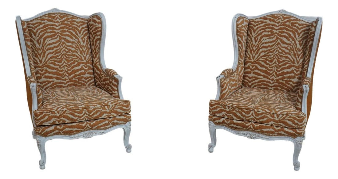 Elegant Pair of French Bergere Chairs with Gold Zebra Print Upholstery: Elegant Pair of French Bergere Chairs with Gold Zebra Print Upholstery This stunning pair of French style Bergere chairs features a modern gold zebra print upholstery, expertly reupholstered to bring 
