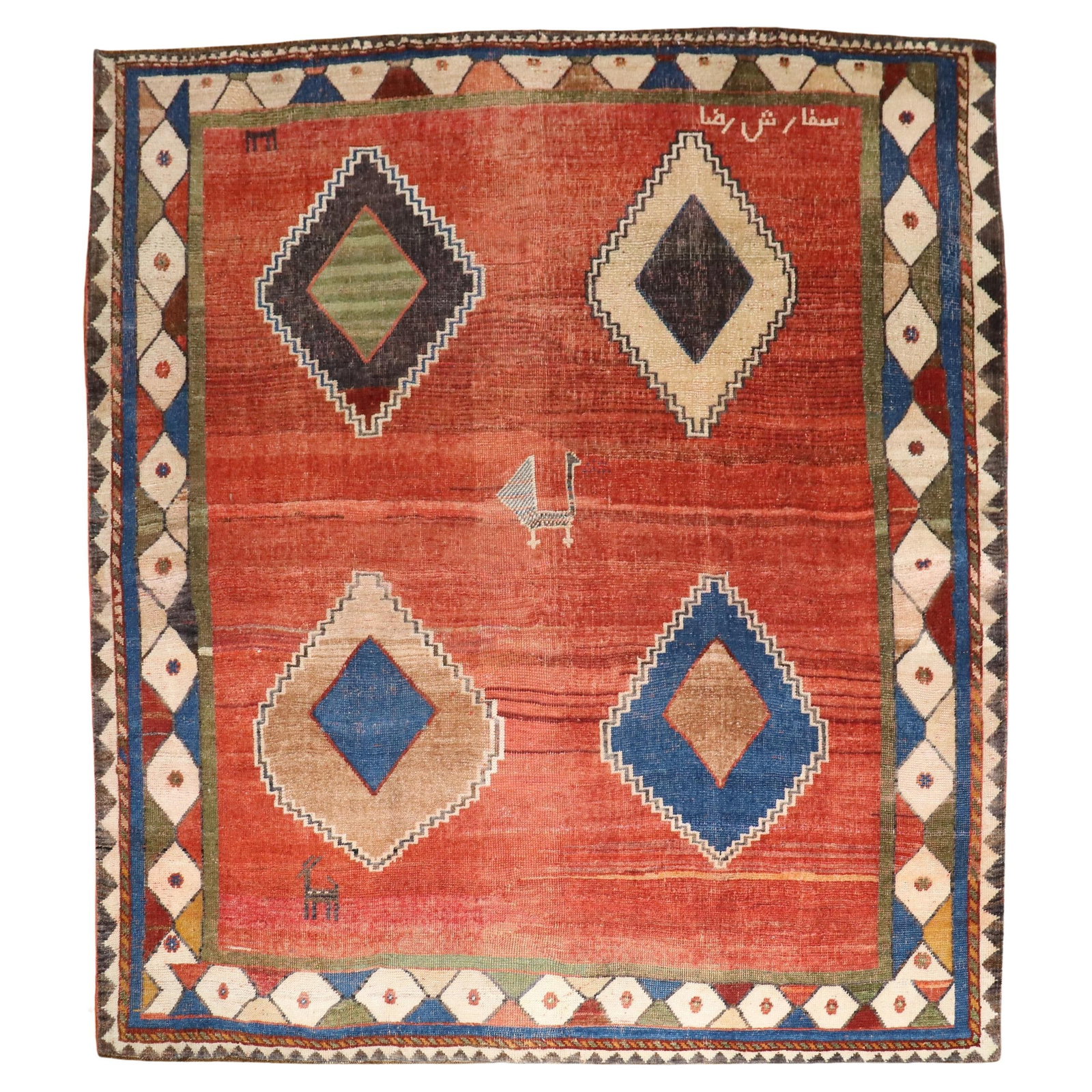 Rare 1940 Tribal Square Gabbeh Rug Hand-Knotted Wool: Rare 1940 Tribal Square Gabbeh Rug Hand-Knotted Wool Discover the unique charm of this rare square-shaped Tribal Persian Gabbeh rug, handcrafted in the 1940s. This exquisite piece features a striking 