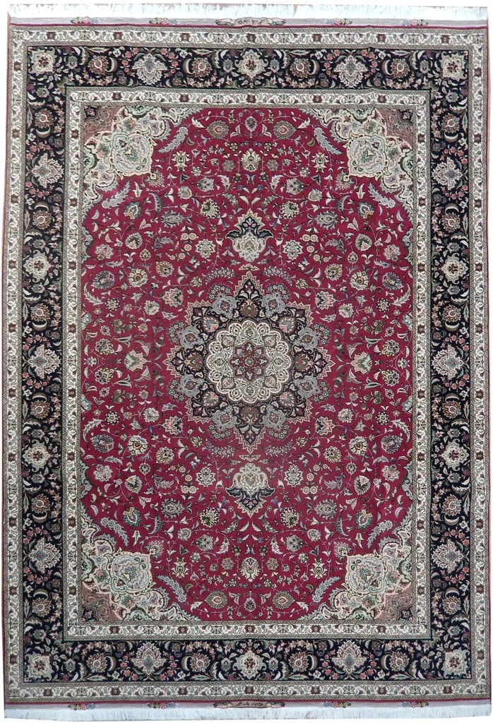 8 x 11.5 Signed Persian Tabriz Rug Wool and Silk Handmade Iran: 8 x 11.5 Signed Persian Tabriz Rug Wool and Silk Handmade Iran Free continental US Shipping This 8 x 11.5-foot signed Persian Tabriz rug is a high-end, hand-knotted piece crafted in Iran. Made from a 