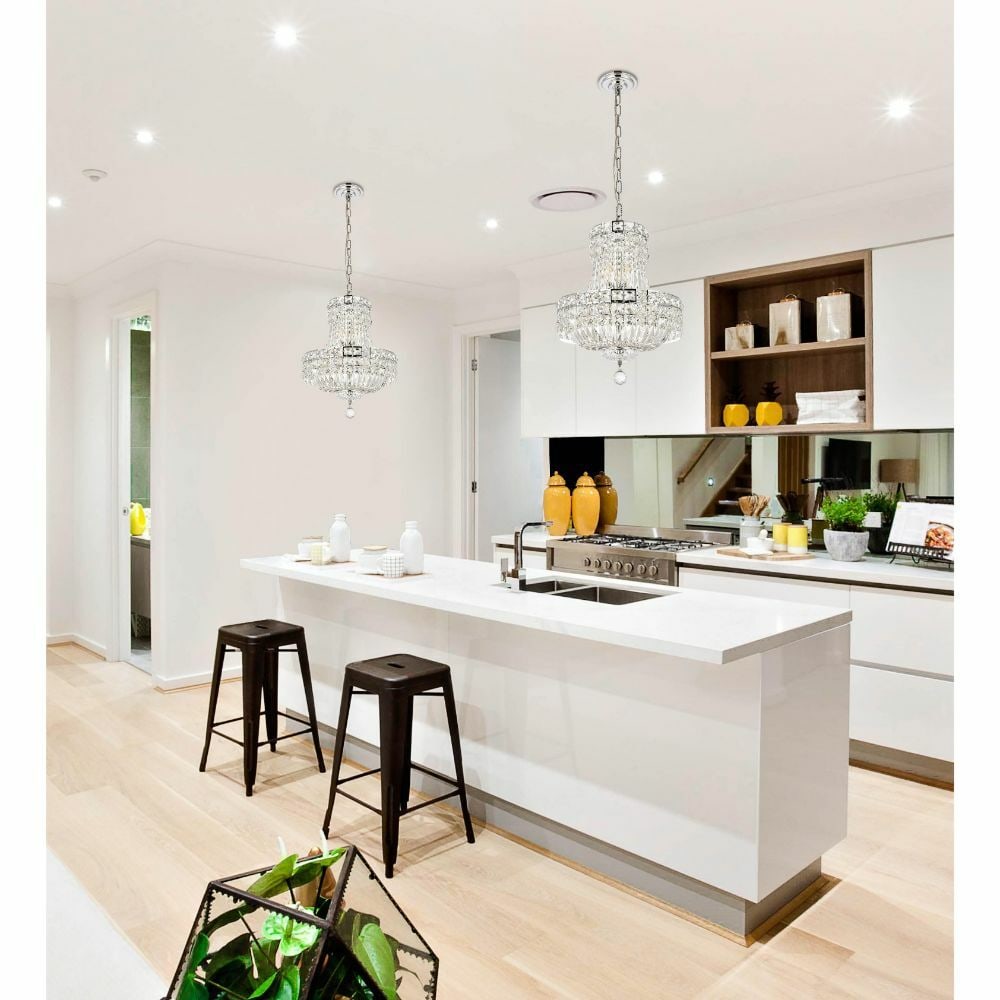 Tranquil crystal glass chrome pendant chandelier 6 lights 14 inch: Tranquil crystal glass chrome pendant chandelier 6 lights 14 inch This elegant pendant chandelier features a chrome finish and is adorned with hand-cut and polished royal cut crystals, offering a soph