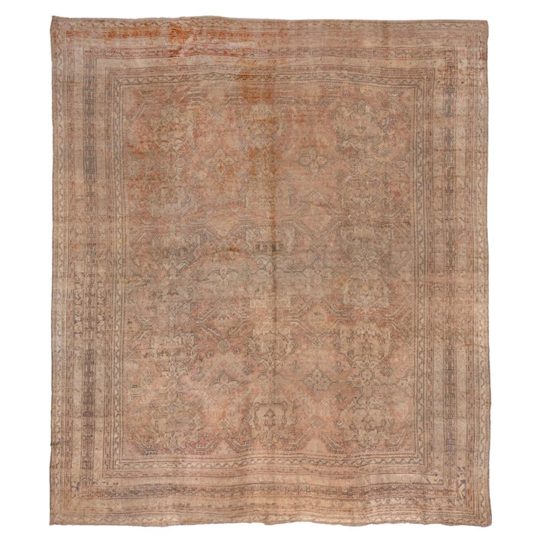 Antique Oushak 16'7" x 18'7" Turkish Wool Rug in Peach: Antique Oushak 16'7" x 18'7" Turkish Wool Rug in Peach Introducing the exquisite Zabihi Collection Oversize Square Turkish Oushak Rug, an elegant addition to any space. This stunning antique rug, craf