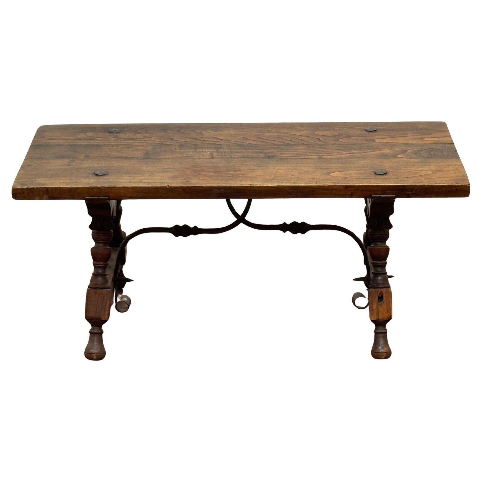Early 20th Century Spanish Walnut and Iron Baroque Coffee Table: Early 20th Century Spanish Walnut and Iron Baroque Coffee Table This Spanish Castilian refectory style coffee table is crafted from solid walnut and wrought iron, reflecting early 20th-century Spanish