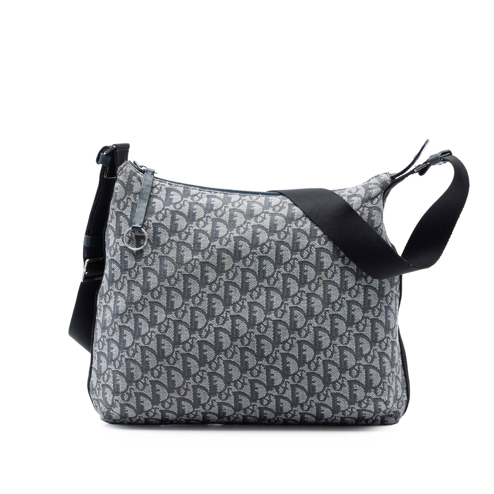 Dior Diorissimo Trotter Blue Canvas Adjustable Strap Crossbody Bag: Dior Diorissimo Trotter Blue Canvas Adjustable Strap Crossbody Bag This Diorissimo Trotter Canvas Crossbody bag features a blue canvas body, an adjustable flat shoulder strap, a top zip closure, and a