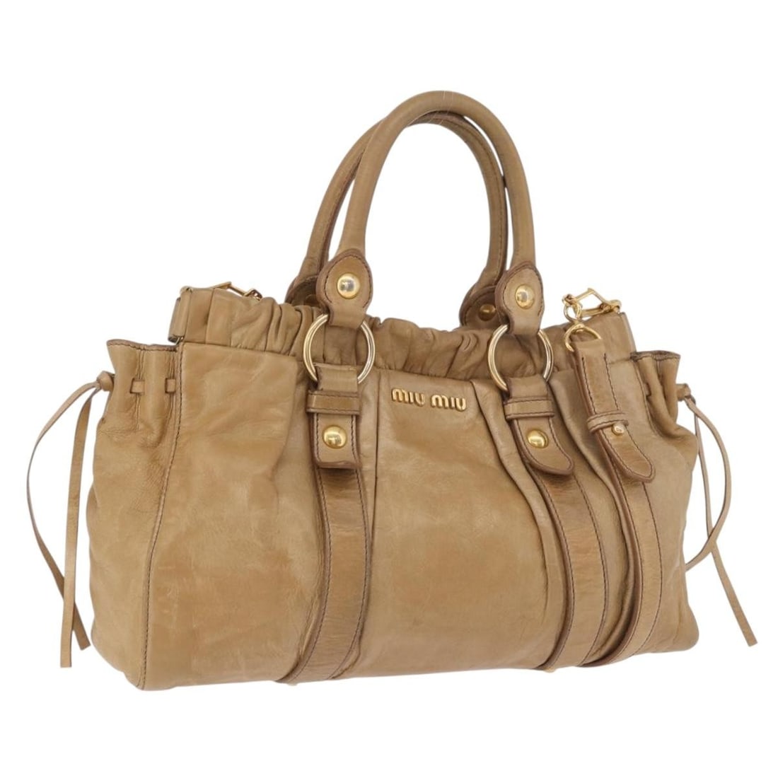 Miu Miu Beige Leather 2 Way Handbag Gold Tone: Miu Miu Beige Leather 2 Way Handbag Gold Tone Beige leather 2-way handbag from Miu Miu with gold-tone accents. This women's bag was made in Turkey and has been customized with repainting. It includes 