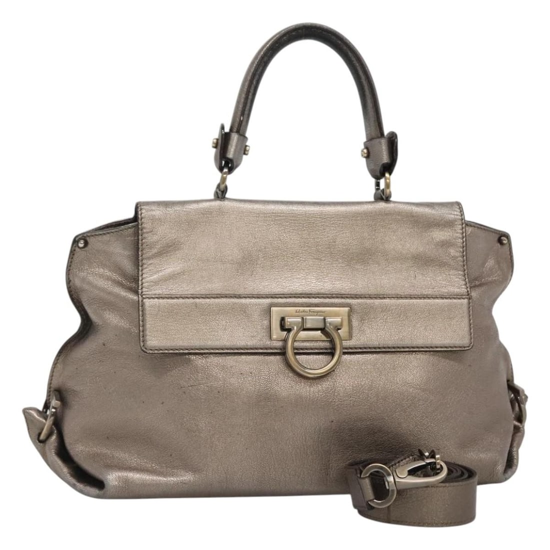 Salvatore Ferragamo Sofia Gancini Silver Leather Handbag with Shoulder Strap: Salvatore Ferragamo Sofia Gancini Silver Leather Handbag with Shoulder Strap This Salvatore Ferragamo Gancini Sofia 2-way hand bag for women is crafted from silver leather and features both top handle