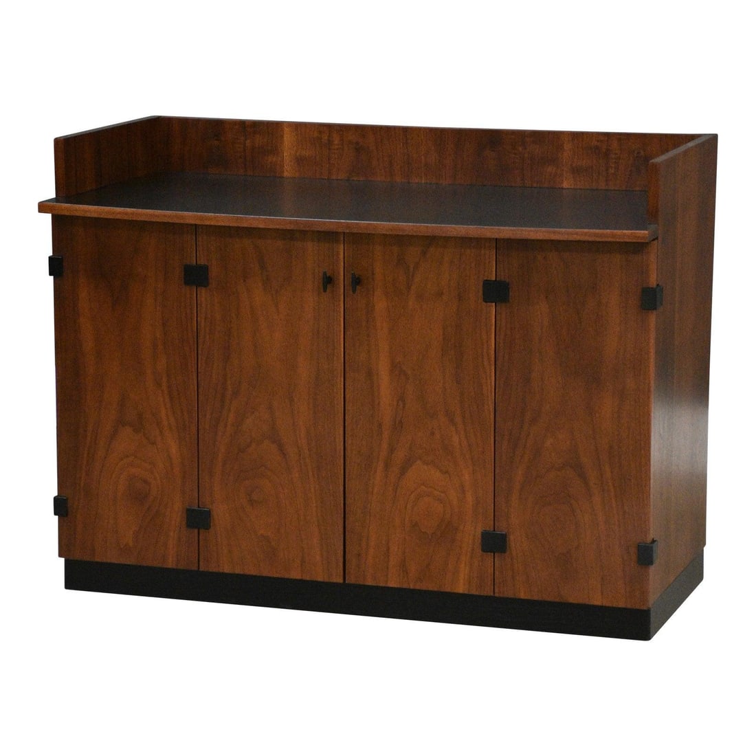 Mid Century Walnut Rolling Bar With Black Accents by Milo Baughman for Directional: Mid Century Walnut Rolling Bar With Black Accents by Milo Baughman for Directional This mid-century modern walnut rolling bar, designed by Milo Baughman for Directional, features black accents and a b