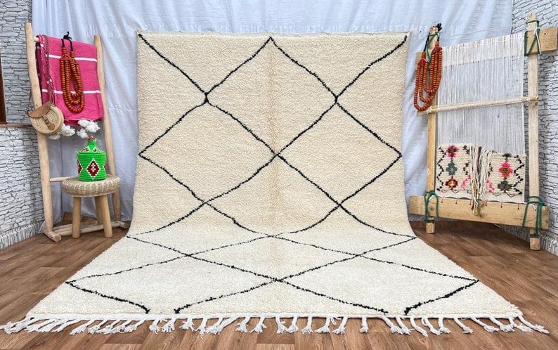 Handwoven Classic White Rug 100% Local Sheep Wool Morocco 10 x 5 Feet: Handwoven Classic White Rug 100% Local Sheep Wool Morocco 10 x 5 Feet Experience the timeless elegance of this handwoven Classic Authentic White Rug, crafted by local Berber women weavers in the Atlas