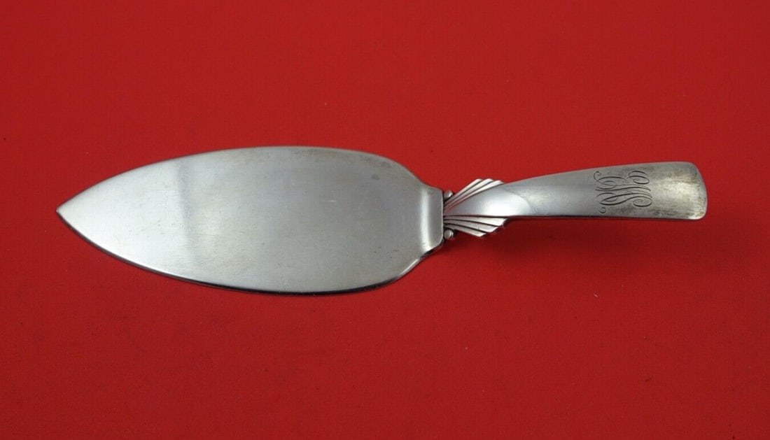 Georg Jensen Ornamental Unknown Sterling Silver Cake Server 7 3/8": Georg Jensen Ornamental Unknown Sterling Silver Cake Server 7 3/8" This exquisite cake server, crafted by Georg Jensen, features the elegant Ornamental Unknown pattern and is made entirely of sterling